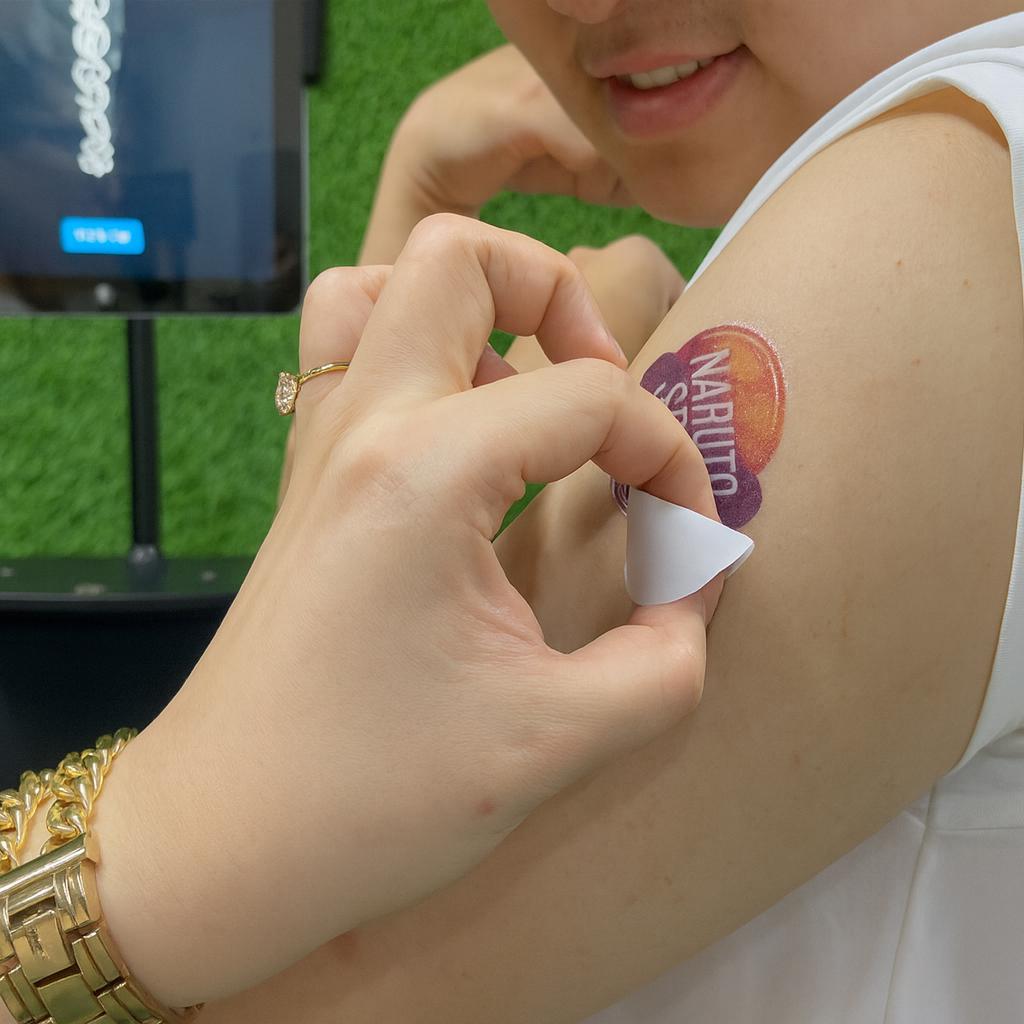Guests creating their own AI Tattoos at exhibition in Dubai
